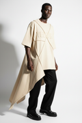 VELMORI Asymmetric Sculptural Tee in ivory cream on Black male model, white background