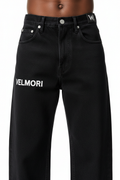 VELMORI Maison Noir Denim — front close-up with embroidered branding